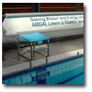 Reel for commercial pool with printed overcover